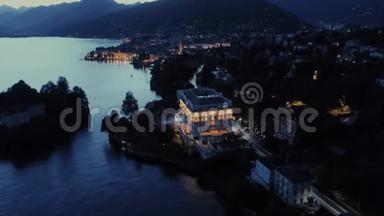 意大利里维埃拉的房子，夜宫灯无人驾驶飞机飞行附近的山脉，意大利湖，无人驾驶飞机4k自然飞行酒店